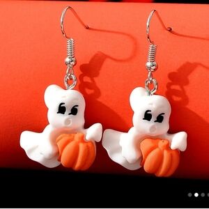 Cute Dangle Resin Ghost Earrings Holding A  Pumpkin